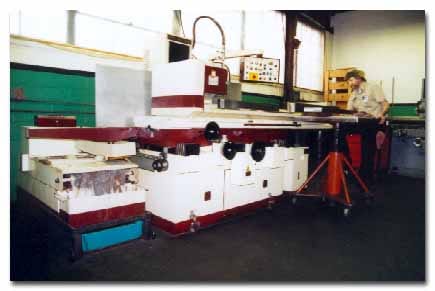 A large surface grinder in the grinding room